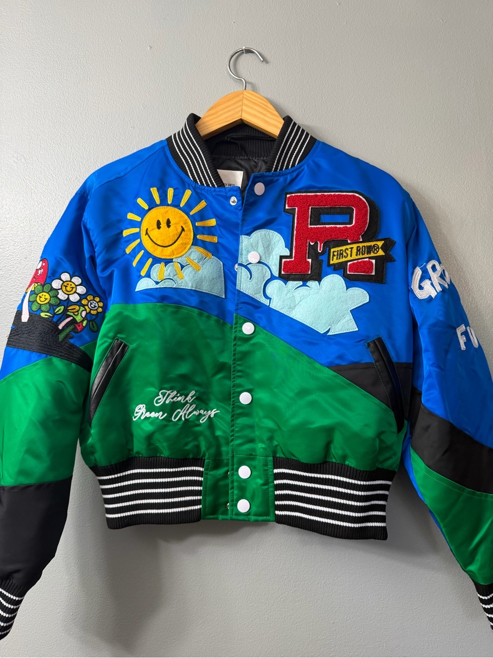 FIRST ROW FIRST ROW THINK GREEN ALWAYS VARSITY JACKET large